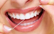 روش صحیح  استفاده از نخ دندان