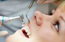 رفع جرم و پلاک دندان با پوست گردو